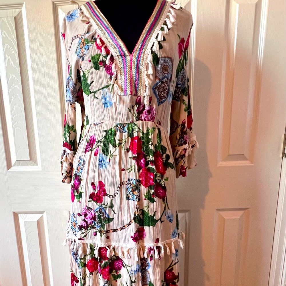 This bohemian multicolored maxi by Emery Rose is a size L.